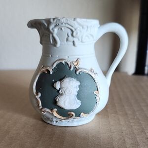 Elegant White and Green Ceramic Pitcher